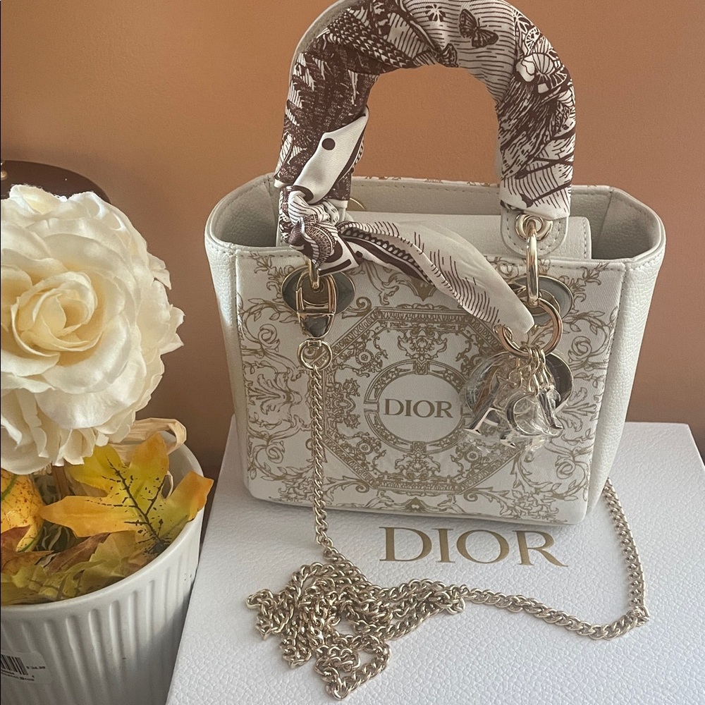 Dior Cream and Gold Mini crossbody bag with magnetic closure. GWP .